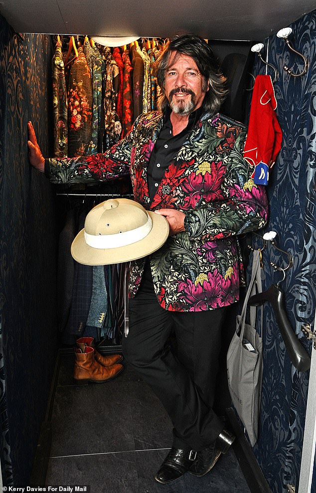 As you'd expect, Laurence's wardrobe is bursting with brightly coloured blazers