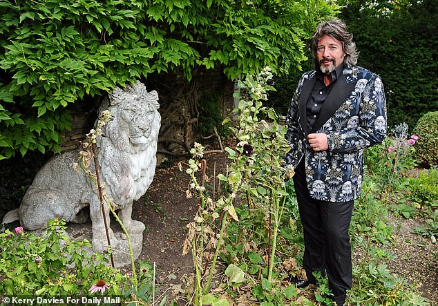 Laurence revealed his wife Jackie had insisted on adding lion statues to their garden