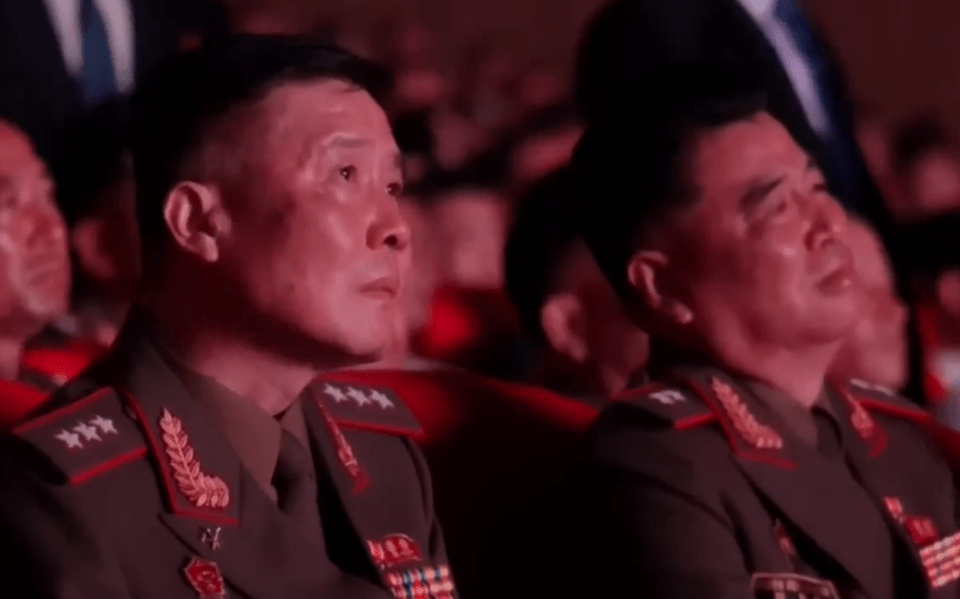 Two North Korean military officers in uniform.