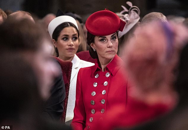 Kate Middleton in Westminster Abbey with Meghan sat behind her. One royal author claimed that Meghan believed staff treated Harry as less important than Prince William
