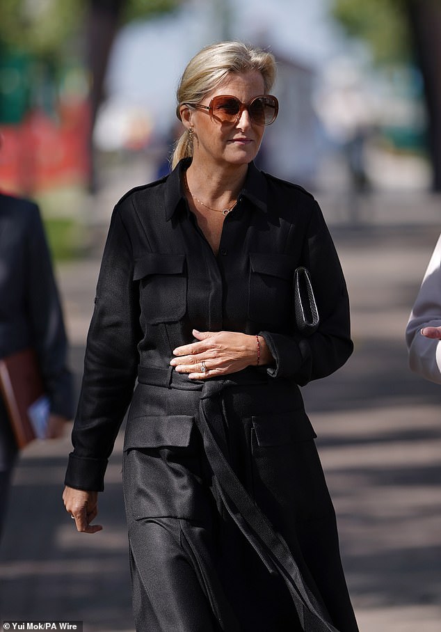 Sophie was seen with a solemn expression as she carried out her duties, and appeared to be wearing mourning attire