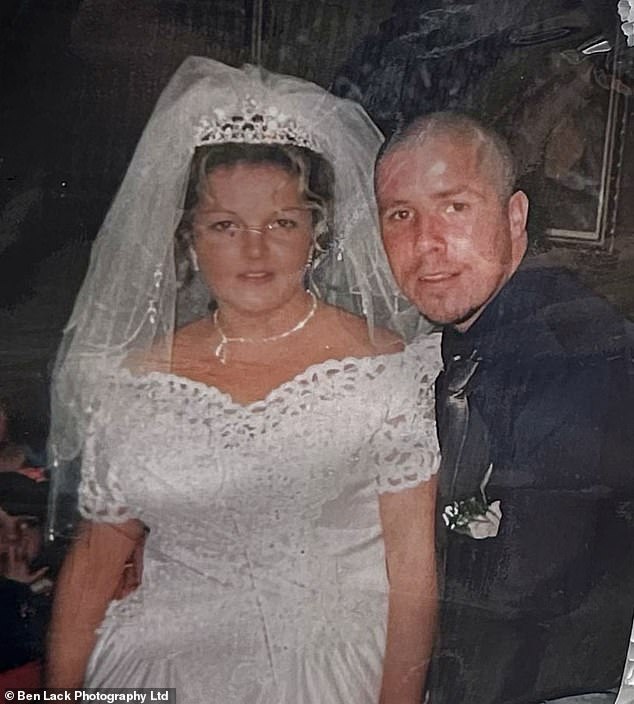 Mr Collins was on holiday in Mallorca to celebrate his wife's birthday in July 2020 when he collapsed and died aged 49. PIctured: Michael and Kathleen's wedding picture
