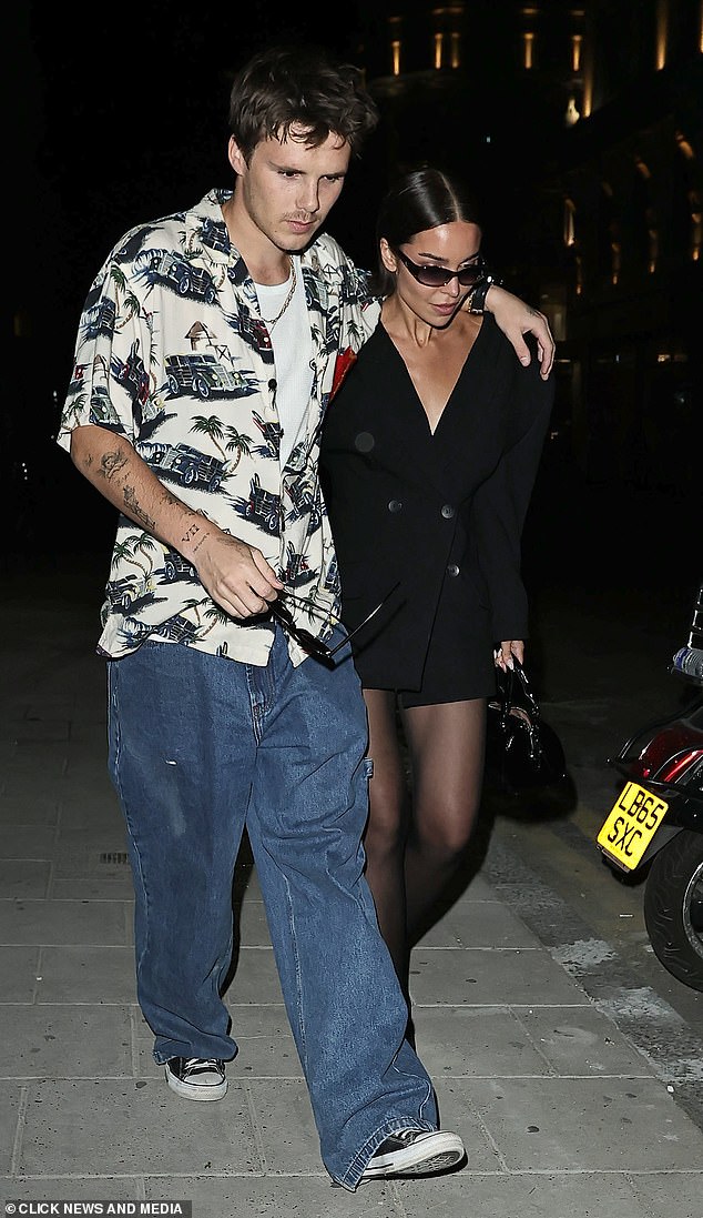 Also there was younger brother Cruz, 20, and his girlfriend Jackie Apostel, 30, – who dressed in a tiny black mini dress looked remarkably like Posh