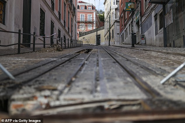 Excavations in the railway are pictured at the site of the Gloria funicular accident after the wreckage was removed in Lisbon on September 5