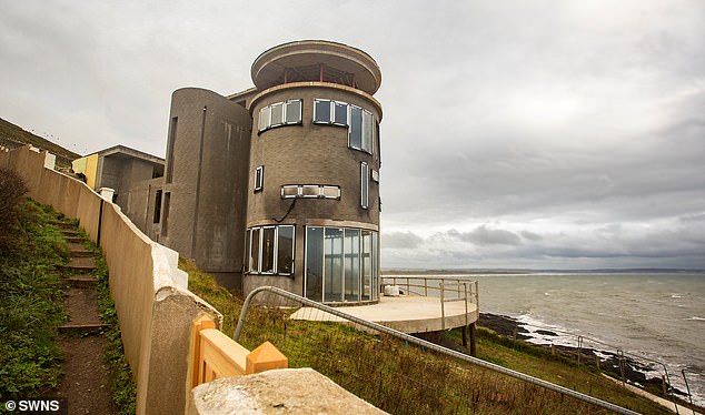 Chesil Cliff House is seen here in more troubled times in 2019, when Mr Short was struggling to finish the property