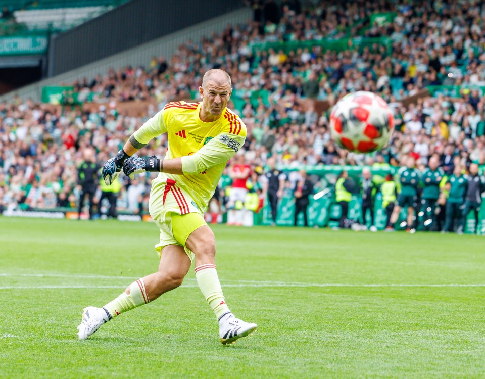 Joe Hart diving to save a penalty during a charity match.