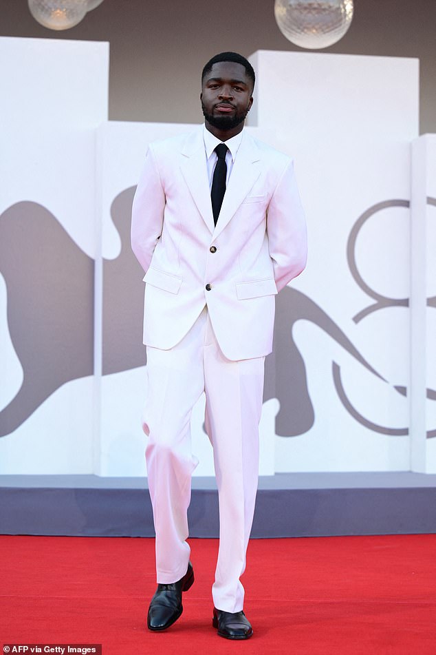 Stephane Bak cut a stylish figure in all white