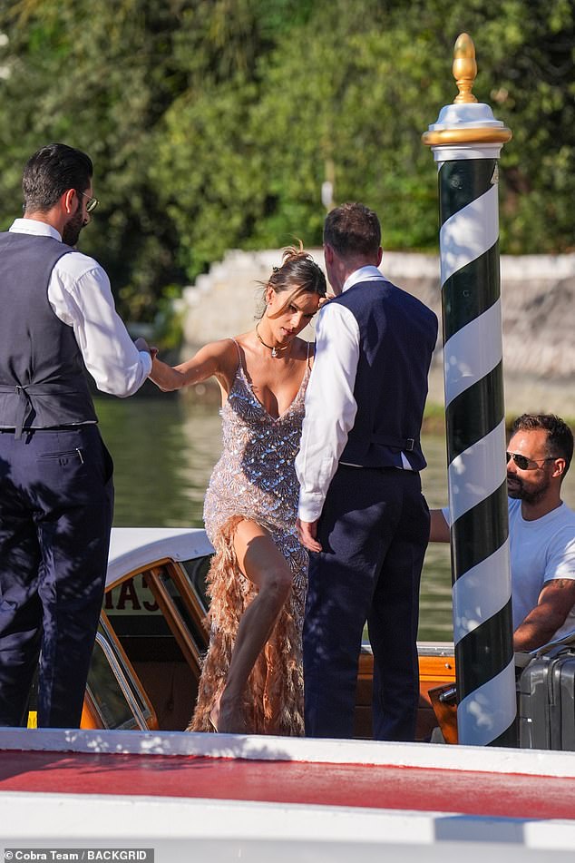 Alessandra was helped up onto the dock by the boat crew