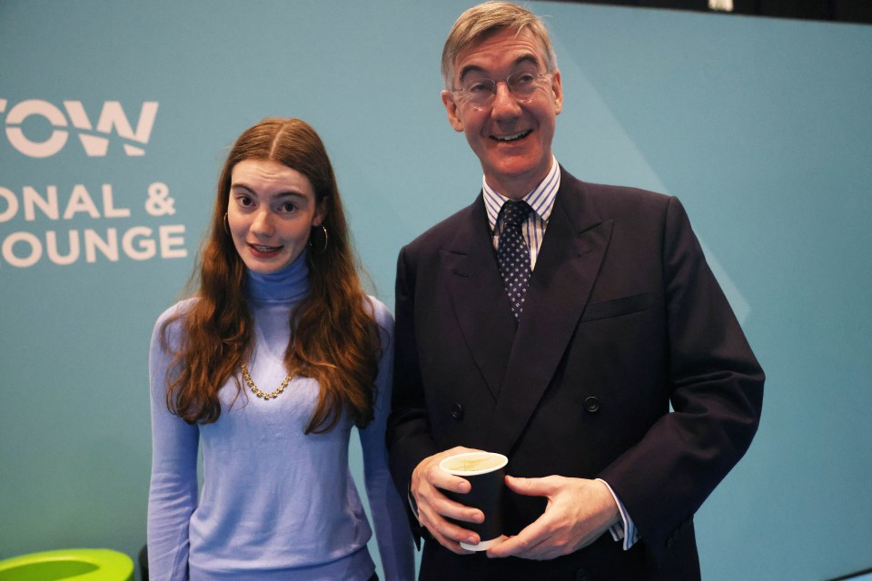 Jacob Rees-Mogg and his daughter Mary at a conference.