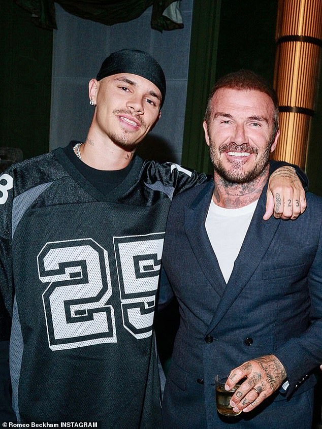Newly released family snaps from the lavish event show Romeo pose with his proud parents David, 52, and Victoria, 51