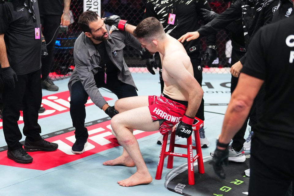 Harry Hardwick of England sits on a stool after losing a UFC lightweight fight.