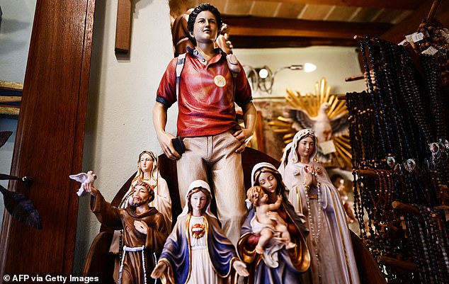 Figurines of Blessed Carlo Acutis have been on sale in a souvenirs shop in Assisi where Acutis is on display