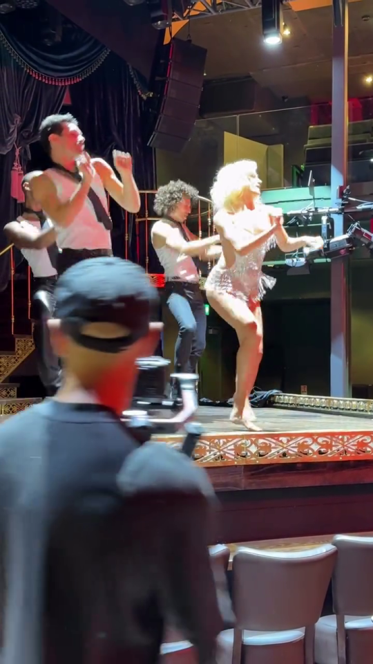 Pixie Lott dancing in a music video.