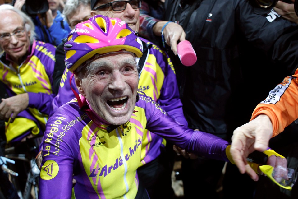 A 105-year-old cyclist celebrating a cycling record.