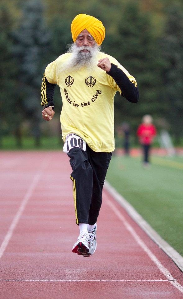 Centenarian Fauja Singh finishing a 100-meter race.