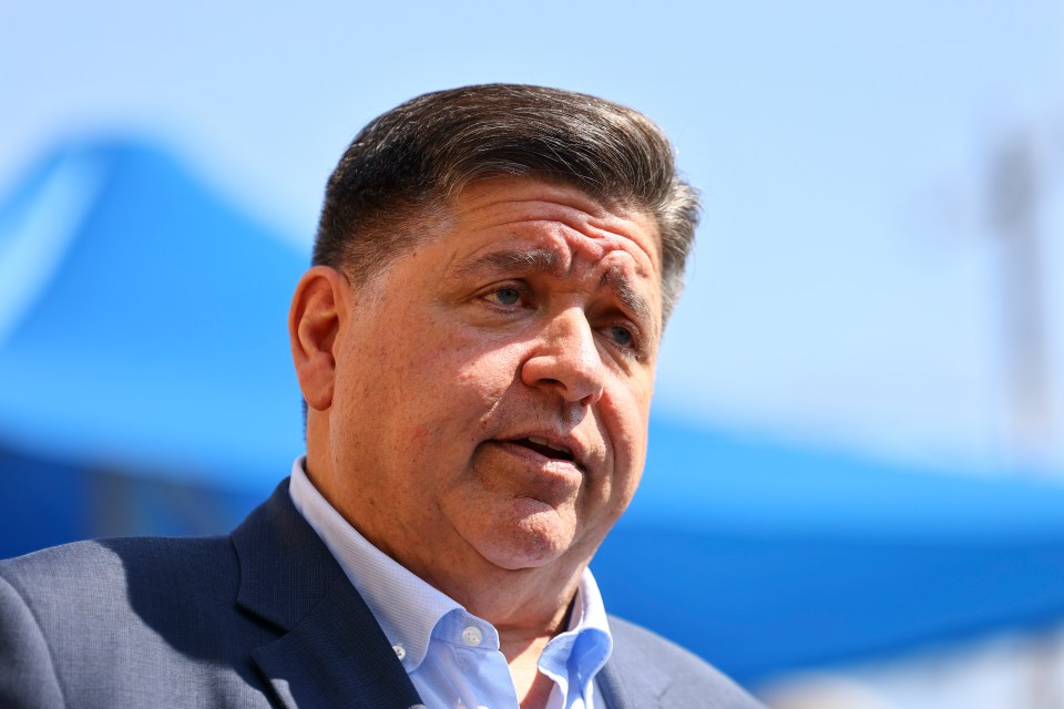 Gov. JB Pritzker speaking with reporters.