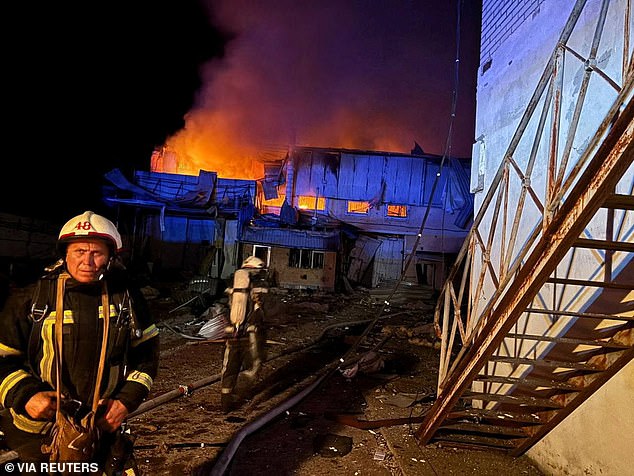 The world is more dangerous and less predictable than ever, and rapid technological evolution is transforming warfare, writes John Healey. Pictured: Firefighters work at the site of car garages hit by a Russian drone strike
