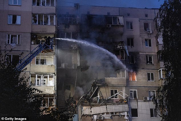 Firefighters put out a fire on a residential building that killed three people following a Russian strike in Kyiv - September 7, 2025