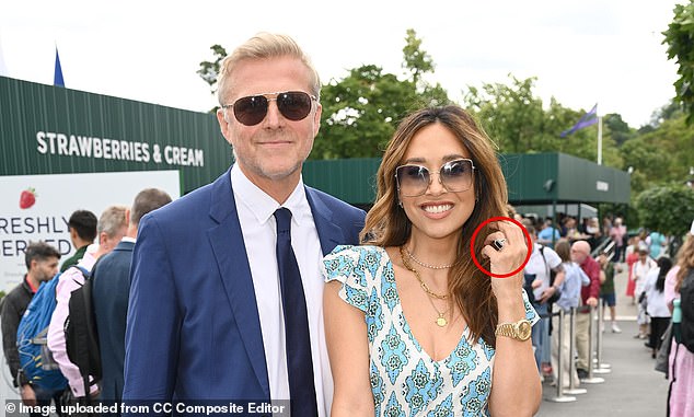 The star wearing her engagement ring with fiance Simon Motson – he had presented her with the ring when he proposed during dinner in the garden of their London home in 2020