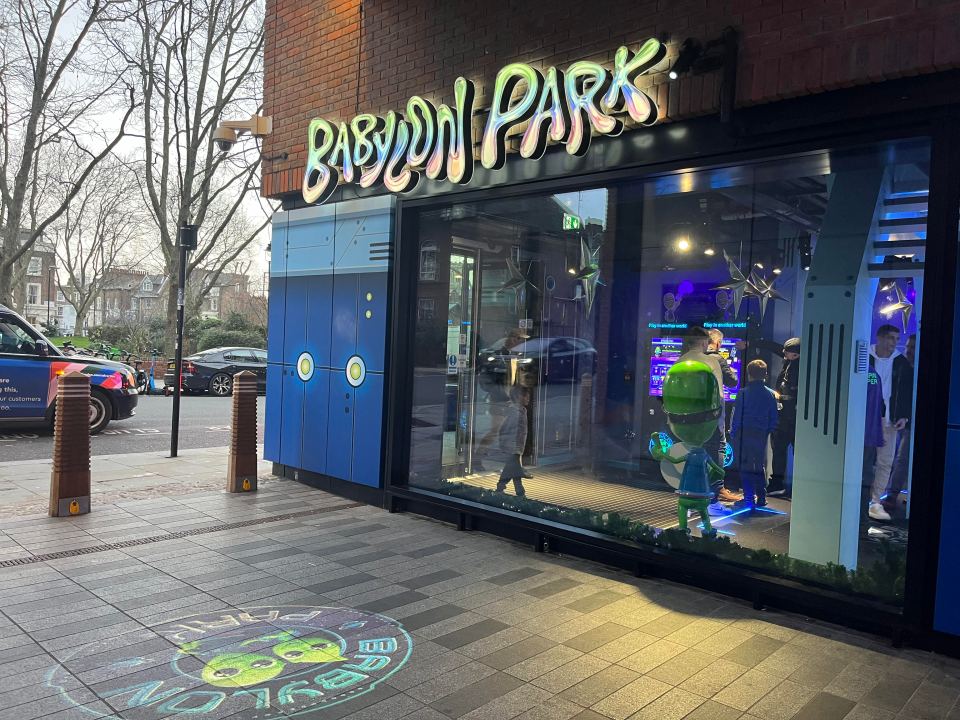 Babylon Park storefront with people inside.