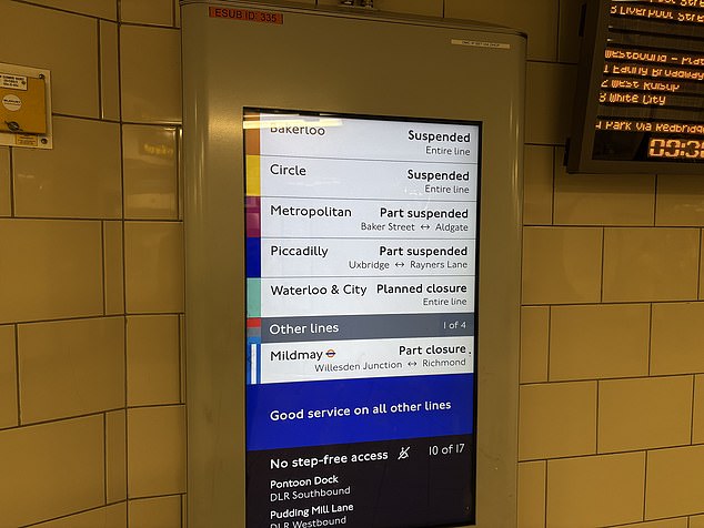 A board in Notting Hill Gate station shows the Bakerloo Line and Circle Line are fully suspended, with the Metropolitan Line and Piccadilly Line part suspended
