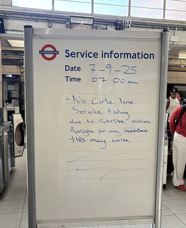 A sign in High Street Kensington shows how the disruption has already started, with no Circle Line service today 'due to strike action'