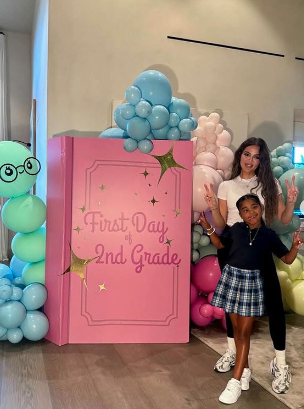 Khloe Kardashian and her daughter celebrating the first day of 2nd grade.