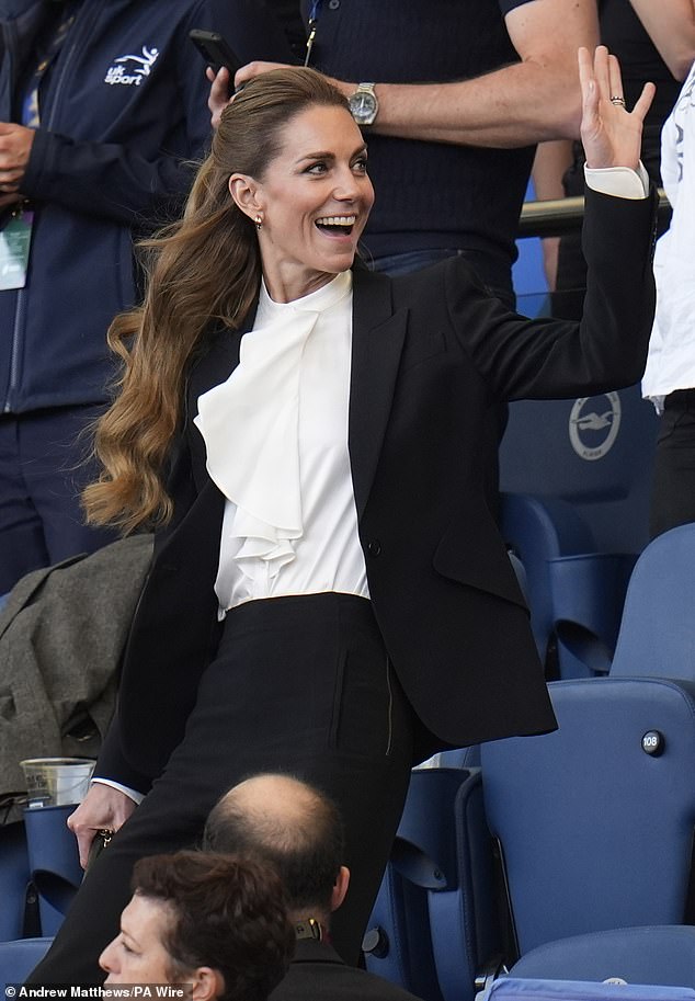 She completed the outfit with sleek black high-waisted trousers and her glam makeup enhanced her flawless complexion