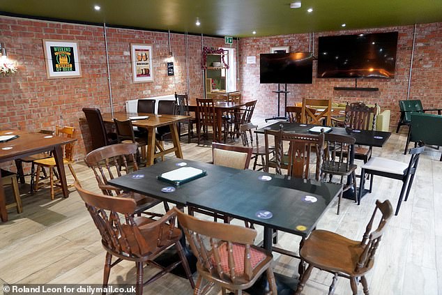 She emphasised: 'My boss Mr Singh has no intention of demolishing the pub, why would he?'. Pictured: The interior of the Cask N Tandoor