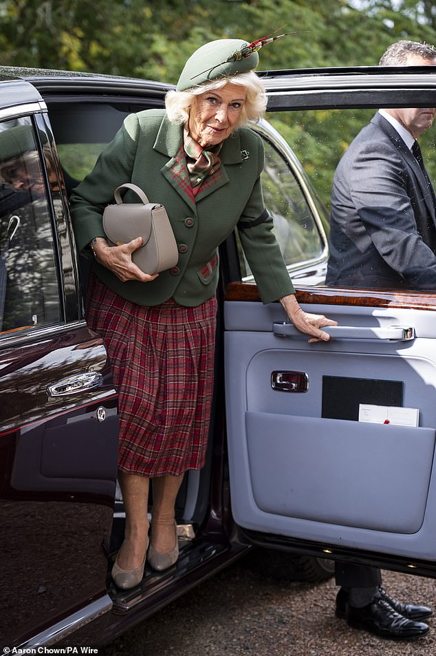 Queen Camila also opted for a tartan skirt, and a dark green blazer with tartan accents