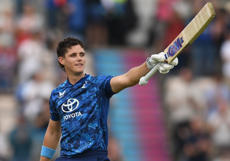 Jacob Bethell of England celebrates scoring a century.