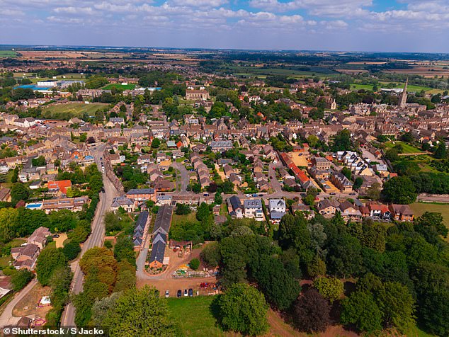 ¿It was a stretch,¿ he admitted. ¿It¿s a beautiful part of the country but everything is so expensive and without two decent wages it would be impossible' (An aerial view of the town)