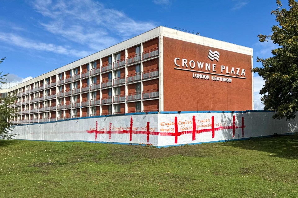Crowne Plaza London Heathrow hotel with graffitied wall.