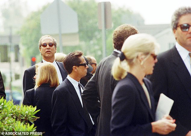 Chevy Chase was among the celebrity mourners at Candy's funeral at St. Martin of Tours Catholic Church in Brentwood on March 9, 1994 - he starred with Candy in National Lampoon's Vacation in 1983