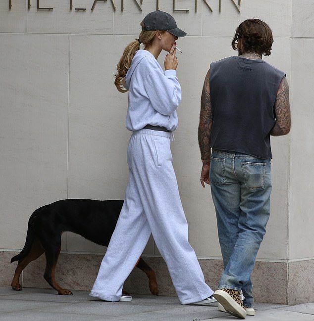 She reiterated that her and Brad's relationship is 'not perfect' but insisted they are still very much together ¿ and that she and Pete are just good friends and work colleagues