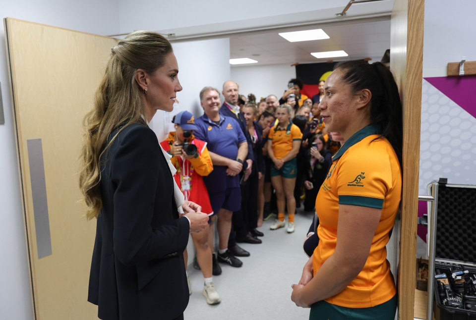 The Princess of Wales speaking with a member of the Australian Women's Rugby team.