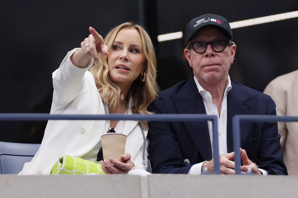 Tommy and Dee Hilfiger at a tennis match.