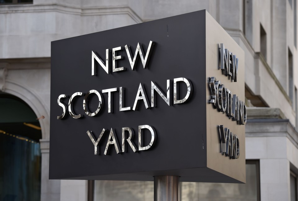 New Scotland Yard sign.