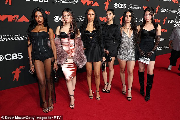 ELMONT, NEW YORK - SEPTEMBER 07: (L-R) Lara Raj, Megan, Manon, Sophia, Daniela and Yoonchae of KATSEYE attend the 2025 MTV Video Music Awards at UBS Arena on September 07, 2025 in Elmont, New York.  (Photo by Kevin Mazur/Getty Images for MTV)