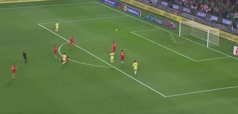 Soccer players near the goal.