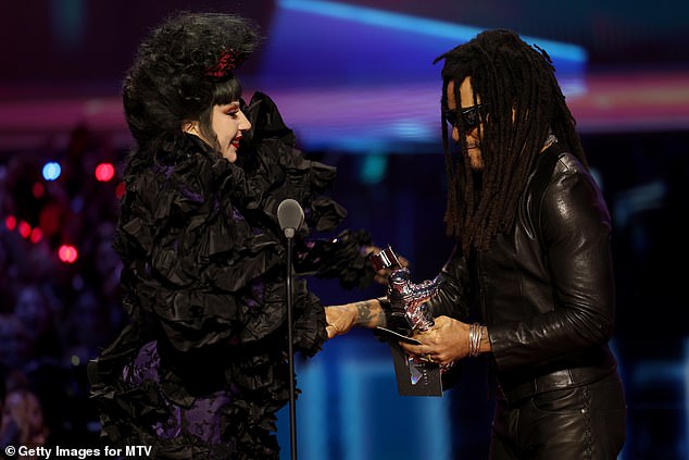 She was presented the award by rock legend Lenny Kravitz