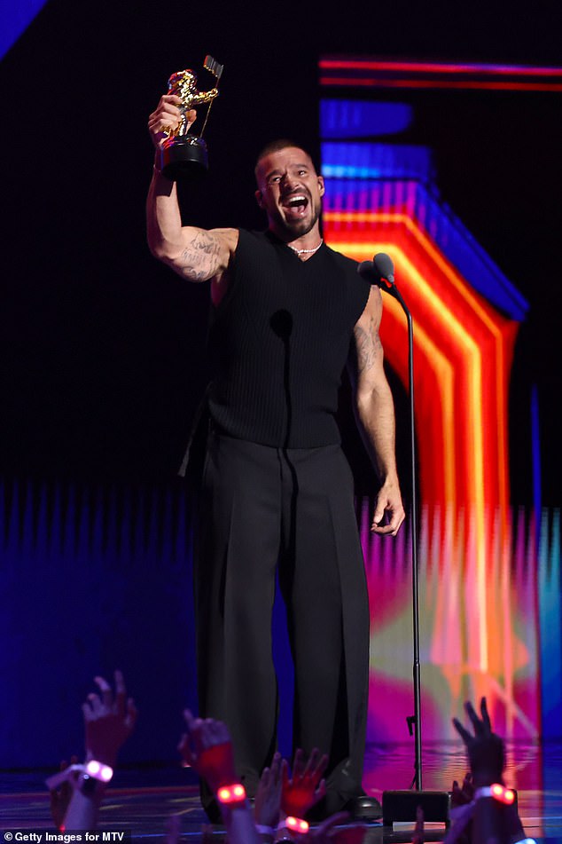 He said: 'I wanted to dedicate this award to my kids. I want to dedicate this award to my kids. Everything I do I do it with you in my mind and my heart'