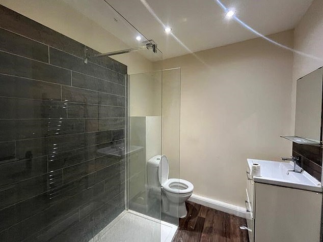 One of the bathrooms inside the huge HMO property boasts a large modern walk in shower