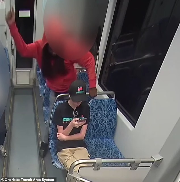 Shocking surveillance footage showed Brown looming over the 23-year-old, swinging the knife at her as she sat with her phone