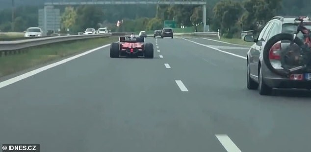 The phantom driver's vehicle has often been described Ferrari Formula 1 car but it has been suggested that it is actually a Dallara GP2/08