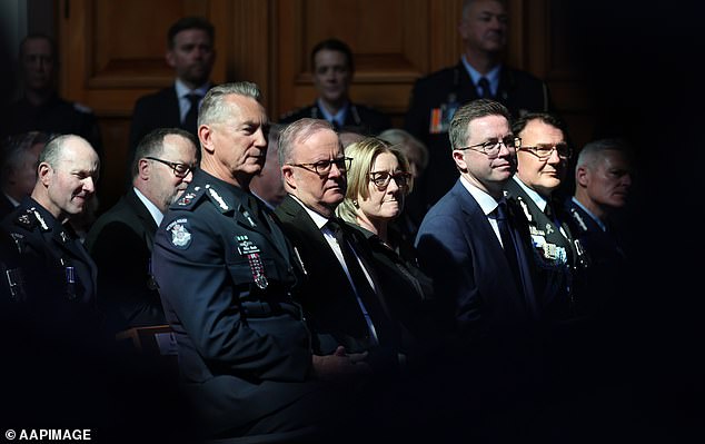 (L-R) Victorian Police Chief Commissioner Mike Bush,  Australian Prime Minister Anthony Albanese, Victorian Premier Jacinta Allan and Victorian Police Minister Anthony Carbines look on during the funeral service for Detective Leading Senior Constable Neal Thompson at the Victoria Police Academy Chapel in Melbourne, Monday, September 8, 2025. (AAP Image/Con Chronis) NO ARCHIVING, POOL
