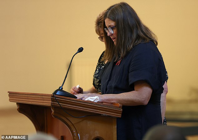 Lois Kirk (sister,  supported by Neal's other sister Diane Thompson) makes a trubte during the funeral service for Detective Leading Senior Constable Neal Thompson at the Victoria Police Academy Chapel in Melbourne, Monday, September 8, 2025. (AAP Image/Con Chronis) NO ARCHIVING, POOL