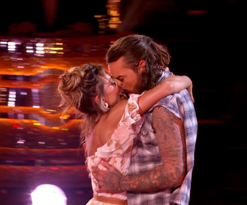 Pete Wicks and Jowita Przystal embracing.