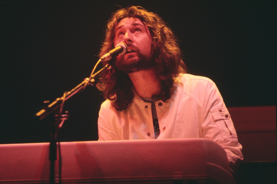 Rick Davies of Supertramp performing live on stage.