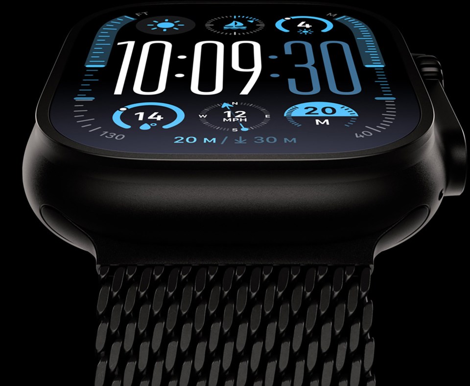 Apple Watch with black Milanese loop band and nautical-themed watch face.